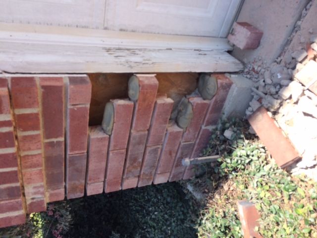 Example of a completed brick wall repair with seamless mortar matching