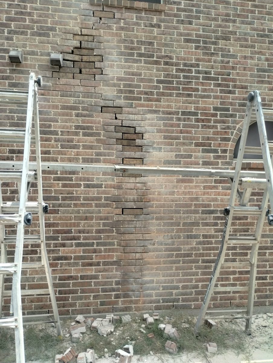 Before — Stair-Step Crack, Wide View — Champion Brick Repair